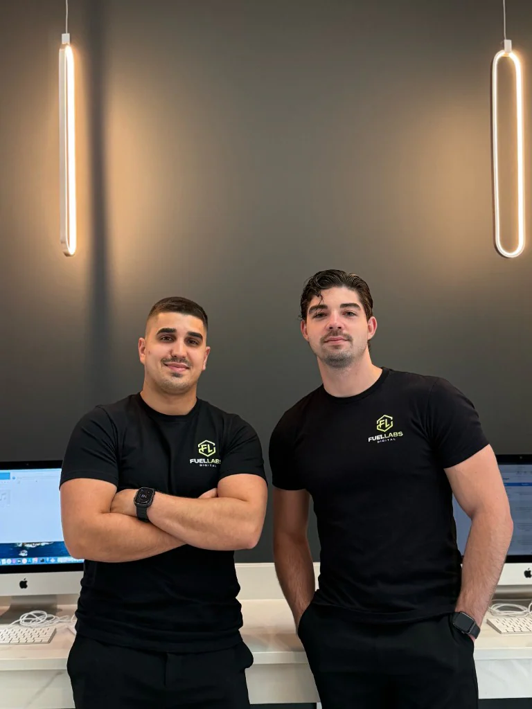 FuelLabs founders standing outdoors in front of palm trees