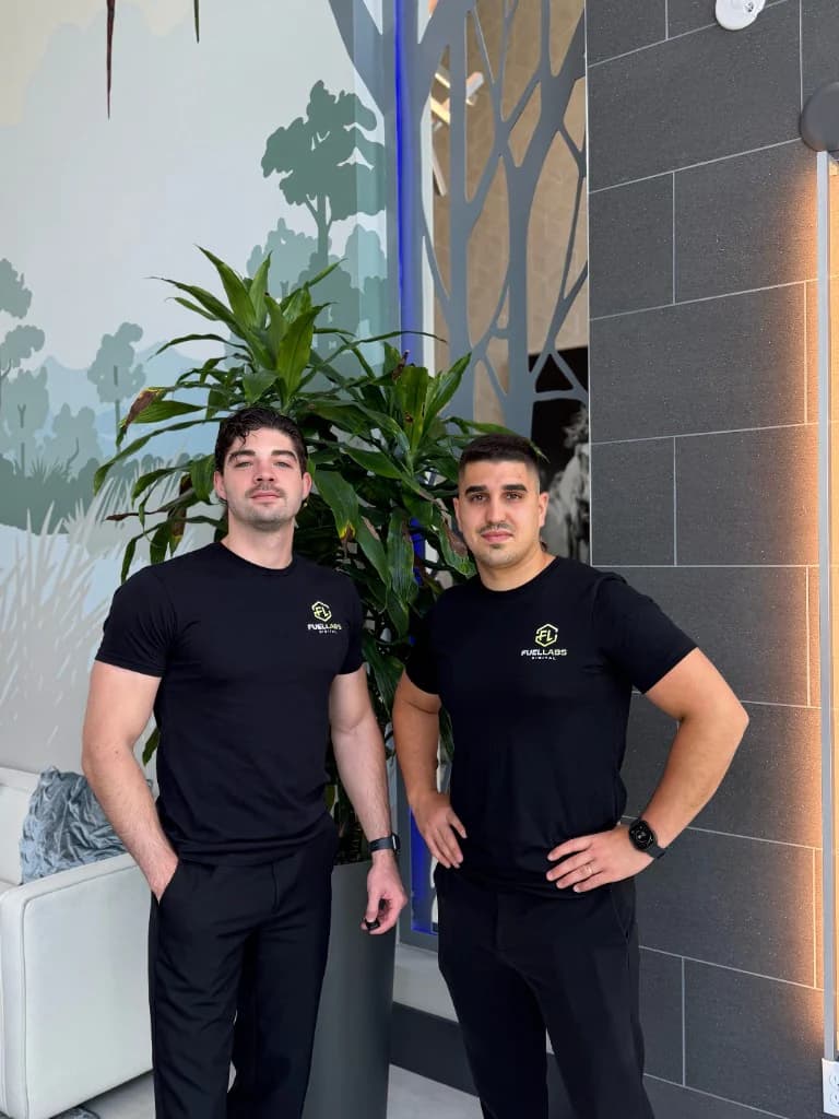 FuelLabs founders standing by an outdoor balcony