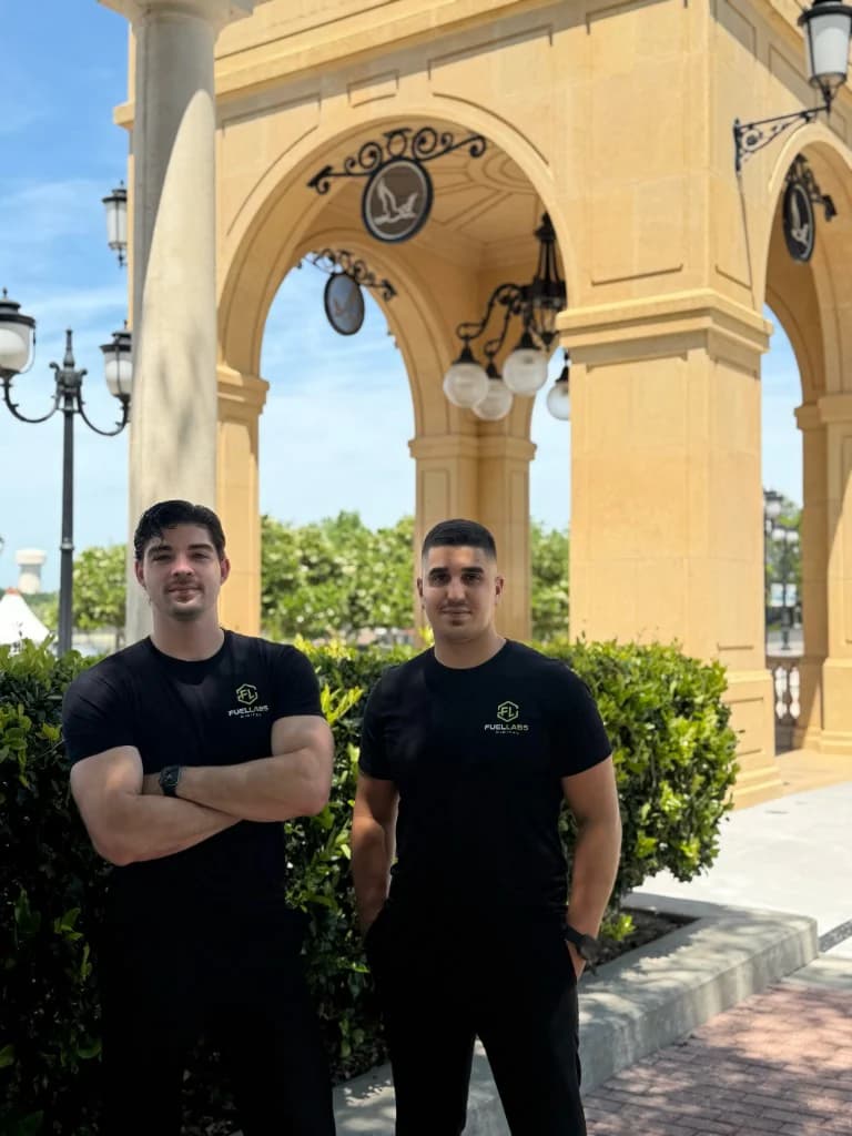 FuelLabs founders working together at computers from behind