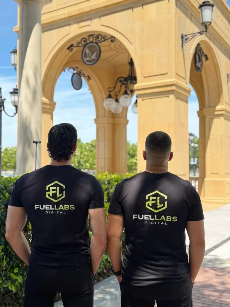 FuelLabs founders standing outdoors with arms crossed