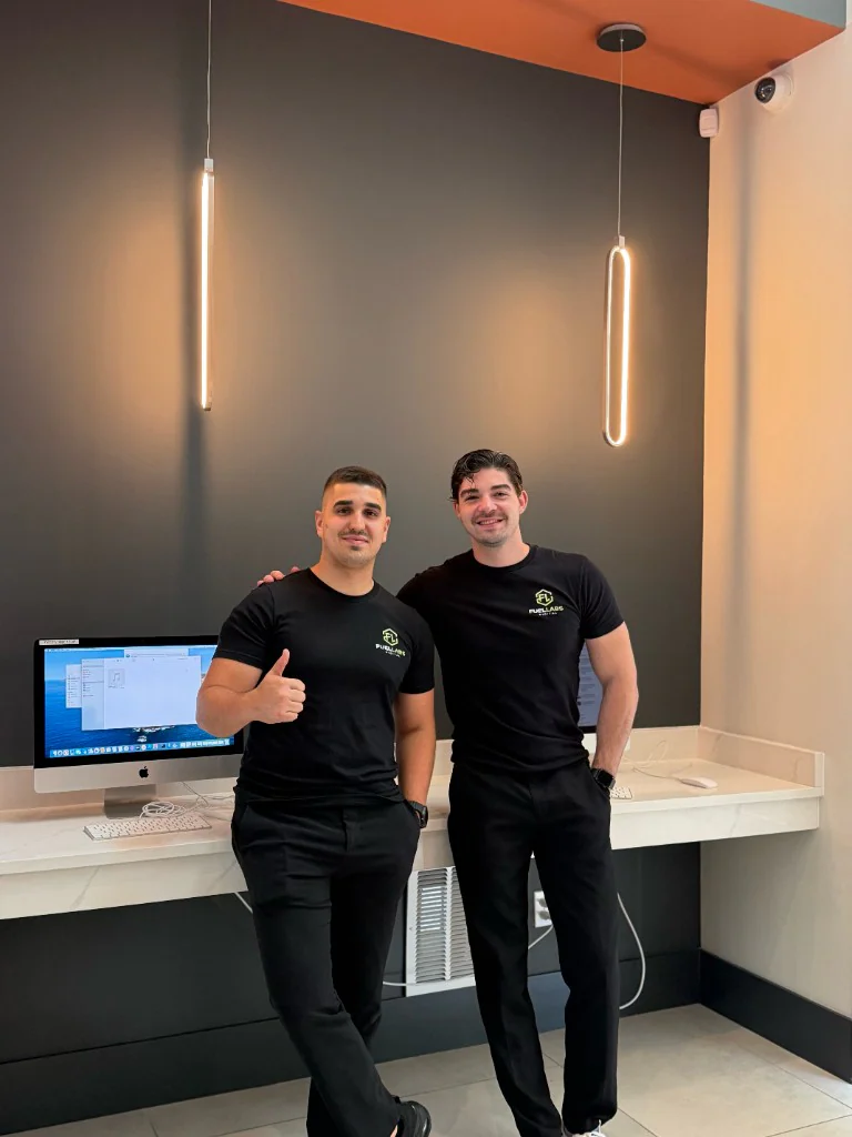FuelLabs founders standing in a park setting