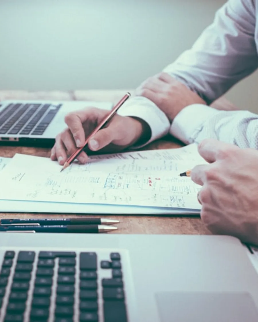 Comparison table ad creative with columns, feature rows, and choose plan CTA.
