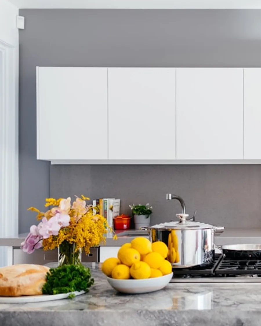 Kitchen setting UGC ad with natural light, headline, and CTA.
