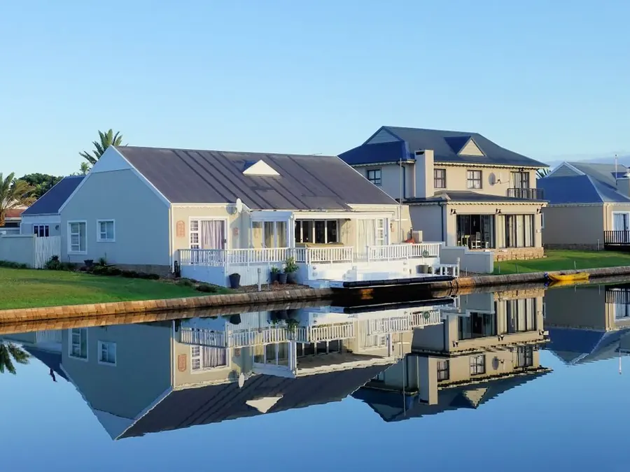 Canal-front residences with palm trees in South Florida