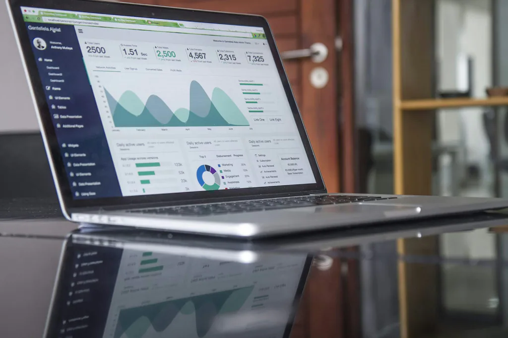 Homeowner researching local contractors on a laptop, comparing portfolios, reviews, and Google Business Profile listings.